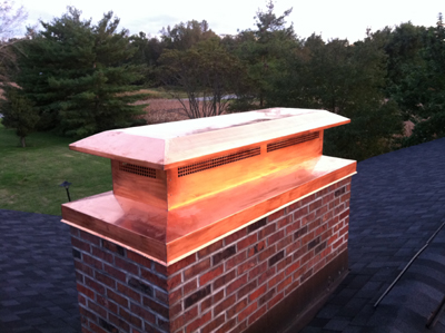 Before and after chimney cap replacement in Wantagh, NY
