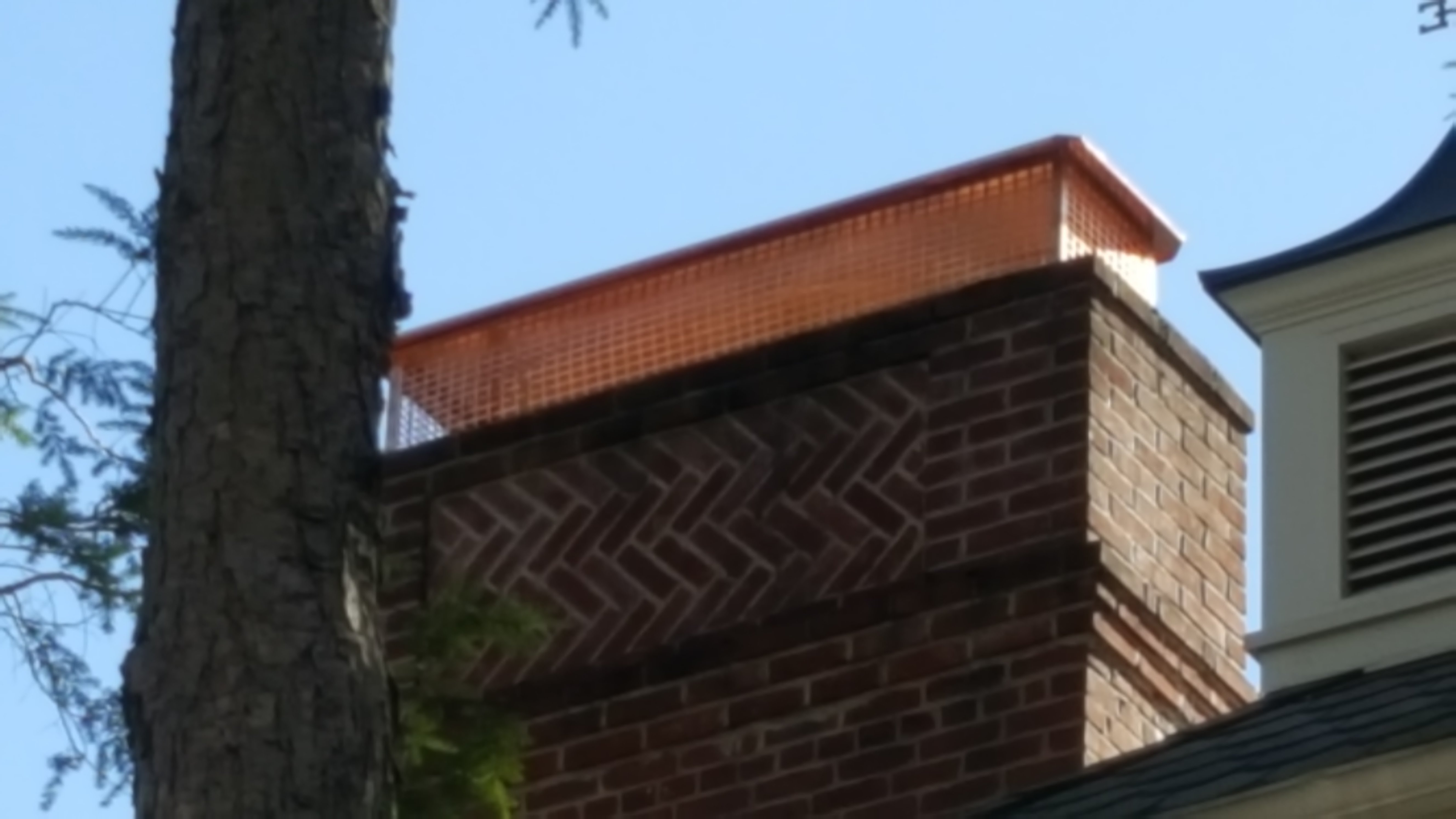 New stainless steel chimney cap installed in Wantagh, NY