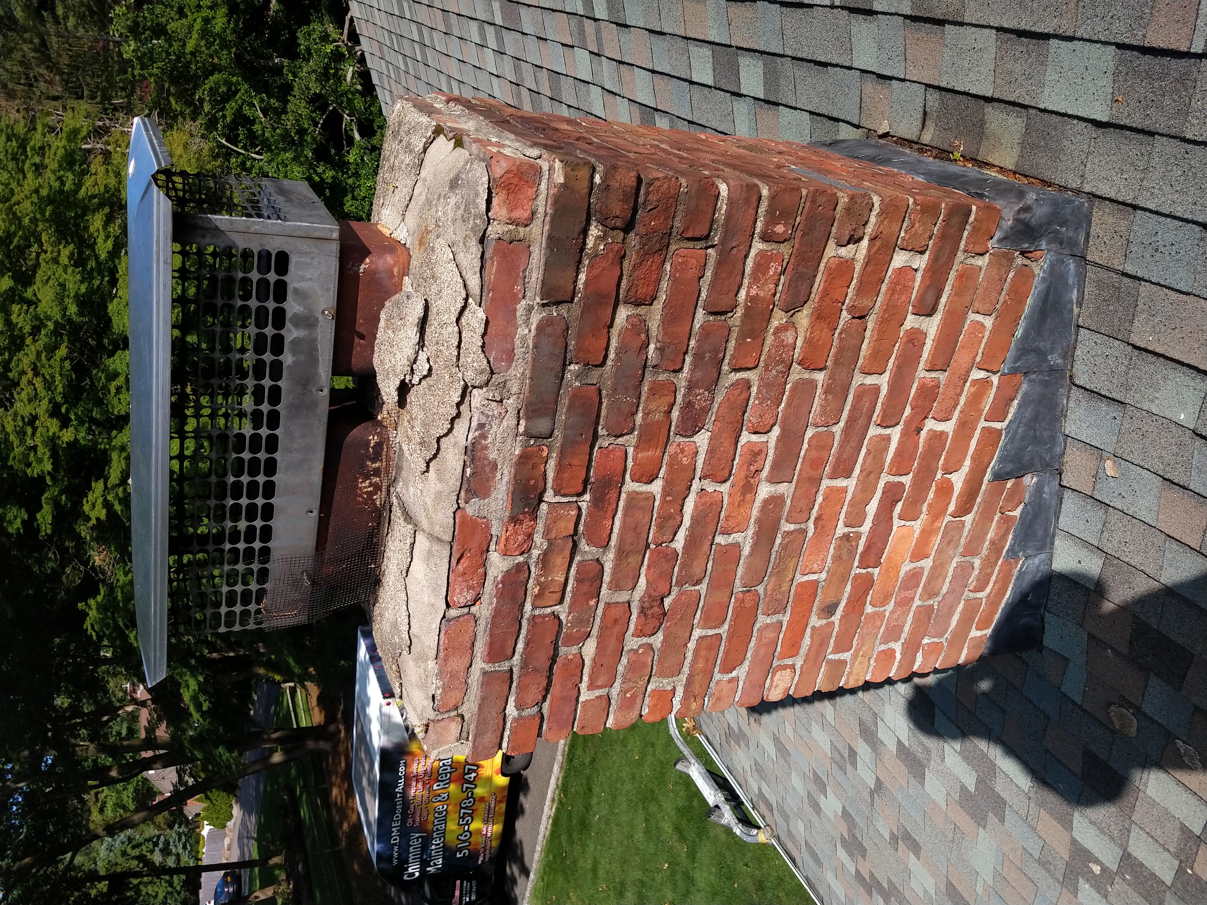 Before and after chimney pointing and tuckpointing in Wantagh, NY