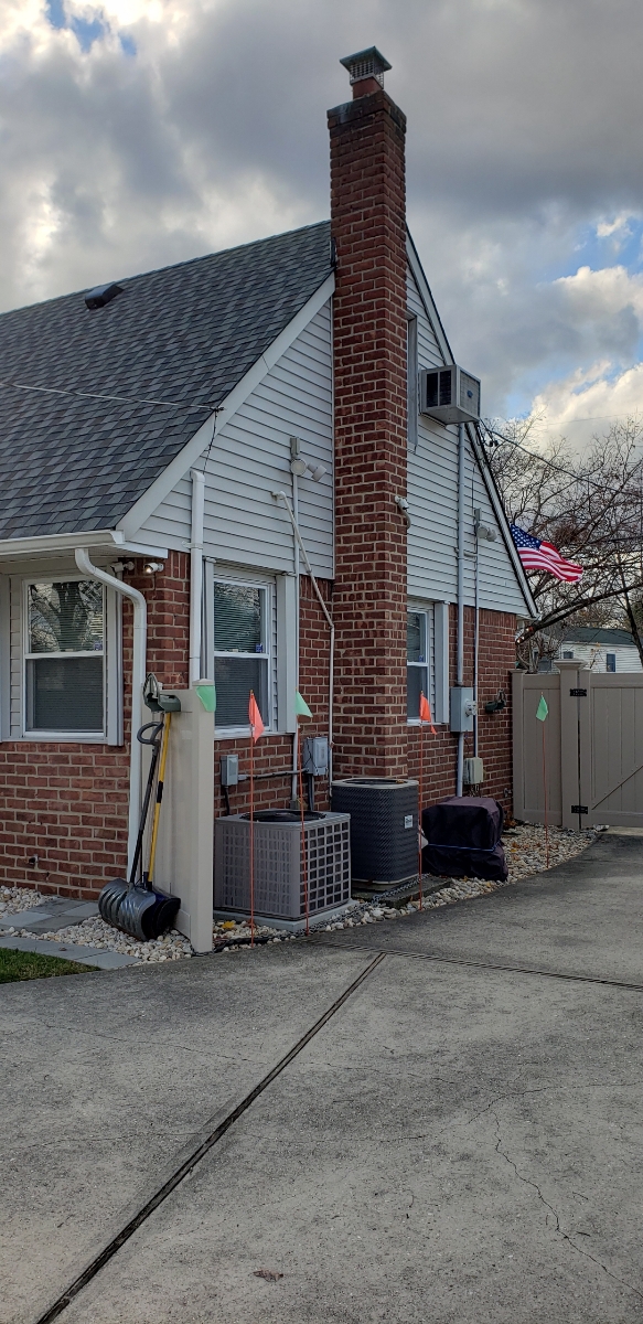 Professional chimney repointing restoring brick joints in Wantagh, NY